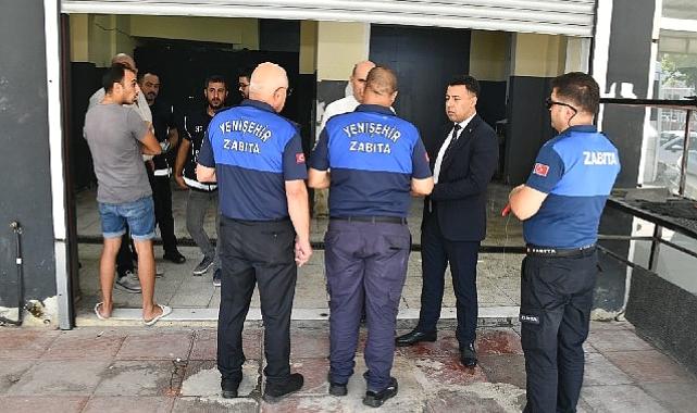 Yenişehir Belediyesi zabıtası bir iş yerinde 28 kaçak göçmen tespit etti